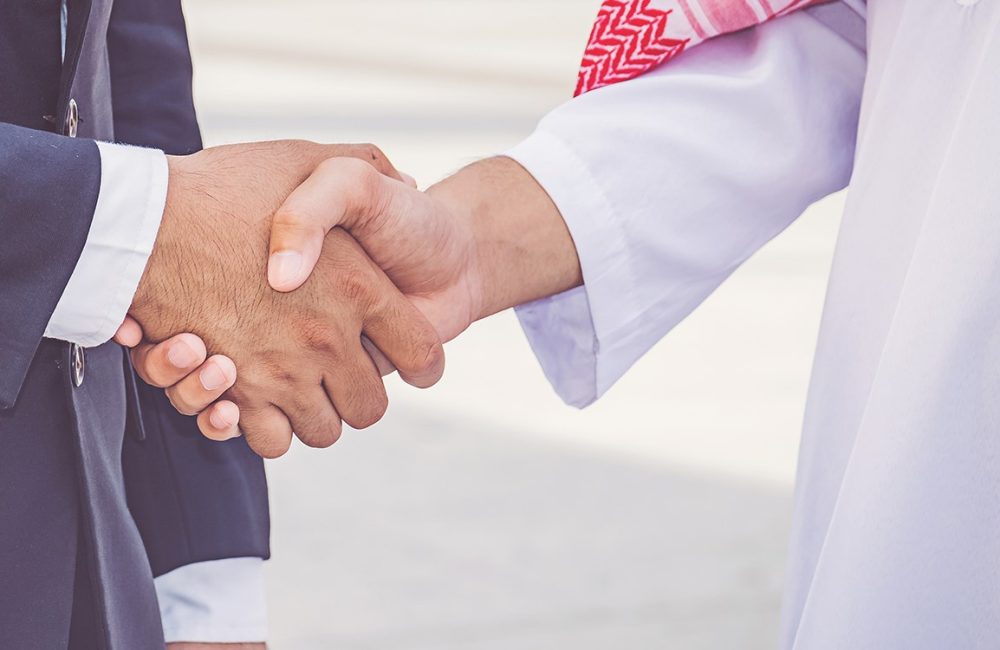 arabic-businessman-giving-handshake-his-business-partner-construction-site-Copy2 (1)